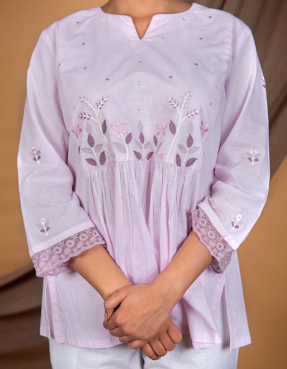 Light pink hand embroidered short kurta