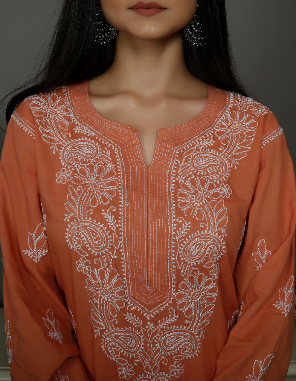 Get-India's-best-quality-Rust-orange-chikankari-cotton-kurta-with-white-palazzo-designs-1